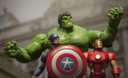 Three action figure superheroes